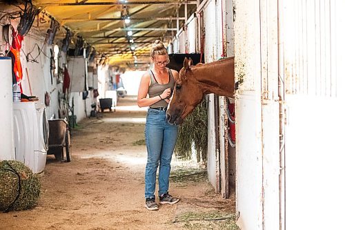 MIKAELA MACKENZIE / FREE PRESS

Groom Katie Morris with Manitoba Derby contender No Show No Call at the Assiniboia Downs on Friday, July 26, 2024. 

For George story.