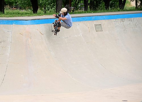 Mike Sudoma/Free Press
Eric Santiago enjoys a skate session at the bowl at the Forks Plaza skatepark in the Friday afternoon heat
July 26, 2024
