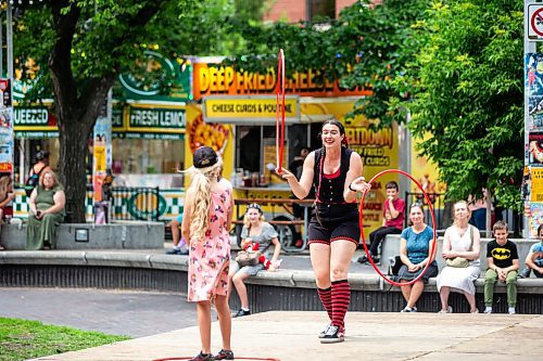 MIKAELA MACKENZIE / FREE PRESS

Luth Wolff performs as Abso-LUTH-ly! at the Old Market Square outdoor stage at Fringe Festival on Friday, July 26, 2024. 

For &#x460;story.