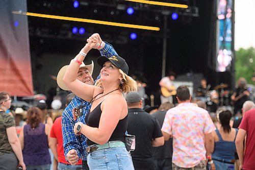 Mike Sudoma/Free Press
At Country Rising Music Festival at Blue Cross Park Friday afternoon
July 26, 2024
