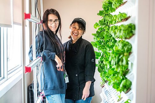 MIKAELA MACKENZIE / FREE PRESS

Kendall Giilck, social enterprise and employment program manager (left), and Tea Travis, kitchen supervisor, with the new hydroponic greens growing system at Siloam Mission on Friday, July 26, 2024. 

For Kevin story.