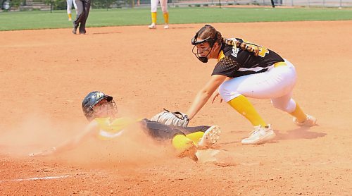 Westman Heat base runner Ella Kulchyski narrowly makes it to the bag in time as Westman Storm third baseman Callee Despiegelaere applies the tag during the bronze-medal game at Softball Manitoba's under-15 AA provincials at Ashley Neufeld Softball Complex on Sunday afternoon. (Perry Bergson/The Brandon Sun)
July 29, 2024