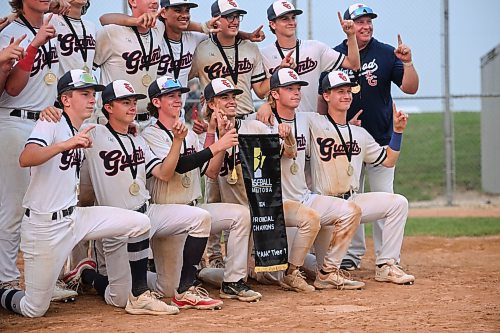 Mike Sudoma/Free Press
The Elmwood Giants share a moment with their 1st place medals and banner after winning the AAA Baseball Manitoba Provincial Championships Sunday evening at Charleswood Place field
July 28, 2024
