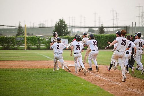 Mike Sudoma/Free Press
The Elmwood Giants storm the field after beating out Winnipeg South at the AAA Baseball Manitoba Provincial Championships Sunday evening at Charleswood Place field
July 28, 2024
