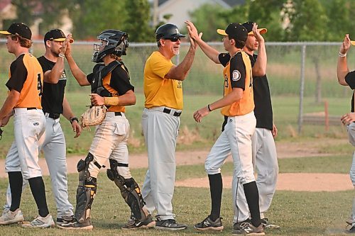 Mike Sudoma/Free Press
Bonivital coaches high five the players after their their team beat out Oildome to take home the AAA Baseball Manitoba Provincial Championships title Sunday evening at Charleswood Place field
July 28, 2024
