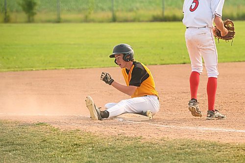 Mike Sudoma/Free Press
Bonivitals Benjamin Graham slides to third plate during the AAA Baseball Manitoba Provincial Championships Sunday evening at Charleswood Place field
July 28, 2024
