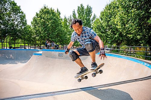 NIC ADAM / FREE PRESS
Multimedia specialist Eric Santiago, 59, shown riding his skateboard at The Forks during his lunch break Monday. He&#x2019;s been riding &#x201c;since forever&#x201d; and says anyone of any age can learn as long as they&#x2019;re determined.
240729 - Monday, July 29, 2024.

Reporter:?