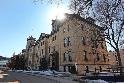 A bright sun peaks out from behind Brandon University's Clark Hall on Friday afternoon. (Matt Goerzen/The Brandon Sun)