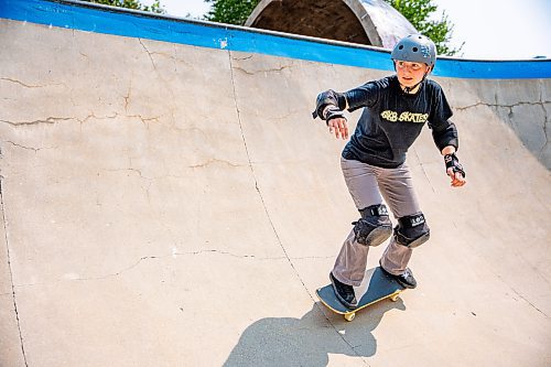 NIC ADAM / FREE PRESS
Liz Miller, who&#x2019;s been skating for a year, is pictured riding her skateboard at The Forks during her lunch break Monday.
240729 - Monday, July 29, 2024.

Reporter:?