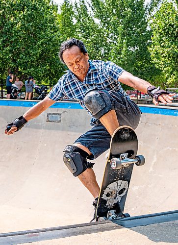 NIC ADAM / FREE PRESS
Multimedia specialist Eric Santiago, 59, shown riding his skateboard at The Forks during his lunch break Monday. He&#x2019;s been riding &#x201c;since forever&#x201d; and says anyone of any age can learn as long as they&#x2019;re determined.
240729 - Monday, July 29, 2024.

Reporter:?