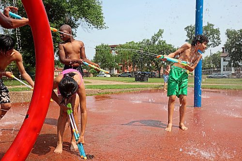 29072024
Friends play together in the cool spray at the Stanley Park spray park on a hot Monday afternoon as part of the Manitoba Possible Deaf and Hard of Hearing Day Camp. Participants in the week-long summer camp will also be going bowling, doing pottery, swimming, visiting the Riverbank Discovery Centre and taking part in other activities. 
(Tim Smith/The Brandon Sun)