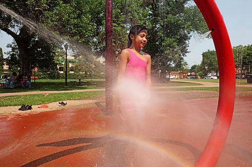 29072024
Zoey Corsino runs through the spray while playing with camp friends at the Stanley Park spray park on a hot Monday afternoon as part of the Manitoba Possible Deaf and Hard of Hearing Day Camp. Participants in the week-long summer camp will also be going bowling, doing pottery, swimming, visiting the Riverbank Discovery Centre and taking part in other activities. 
(Tim Smith/The Brandon Sun)