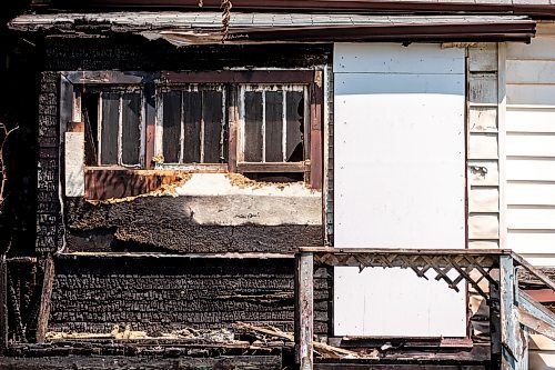 MIKAELA MACKENZIE / FREE PRESS

	
The scene of a recent fire at a vacant, boarded-up bungalow on Burrows Avenue on Tuesday, July 30, 2024. 

For Nicole story.