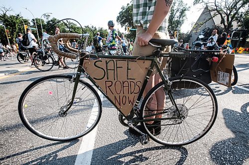 JOHN WOODS / FREE PRESS
About 180 cyclists blocked cars at the intersection of Academy and Wellington Tuesday, July 30, 2024. Cyclists want safe infrastructure after a child was hit by a driver at the intersection yesterday.

Reporter: ?