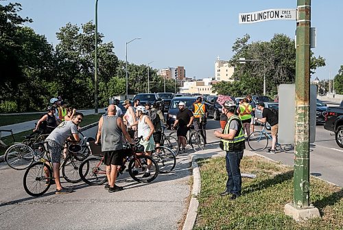 JOHN WOODS / FREE PRESS
About 180 cyclists blocked cars at the intersection of Academy and Wellington Tuesday, July 30, 2024. Cyclists want safe infrastructure after a child was hit by a driver at the intersection yesterday.

Reporter: ?