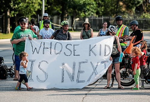 JOHN WOODS / FREE PRESS
About 180 cyclists blocked cars at the intersection of Academy and Wellington Tuesday, July 30, 2024. Cyclists want safe infrastructure after a child was hit by a driver at the intersection yesterday.

Reporter: ?