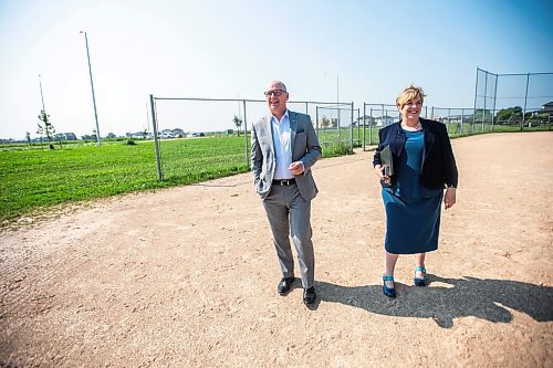 MIKAELA MACKENZIE / FREE PRESS

	
Mayor Scott Gillingham and Consumer Protection and Government Services minister Lisa Naylor walk up to speak to the media about the South Winnipeg Recreation Complex in Bridgwater on Tuesday, July 30, 2024. 

For Jordan story.