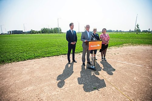 MIKAELA MACKENZIE / FREE PRESS

	
MLA David Pankratz (left), Mayor Scott Gillingham, MLA Lisa Naylor, and MLA Jennifer Chen speak to the media about the South Winnipeg Recreation Complex in Bridgwater on Tuesday, July 30, 2024. 

For Jordan story.