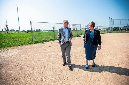 MIKAELA MACKENZIE / FREE PRESS

	
Mayor Scott Gillingham and Consumer Protection and Government Services minister Lisa Naylor walk up to speak to the media about the South Winnipeg Recreation Complex in Bridgwater on Tuesday, July 30, 2024. 

For Jordan story.