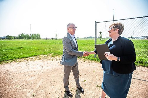 MIKAELA MACKENZIE / FREE PRESS

	
Mayor Scott Gillingham and Consumer Protection and Government Services minister Lisa Naylor walk up to speak to the media about the South Winnipeg Recreation Complex in Bridgwater on Tuesday, July 30, 2024. 

For Jordan story.