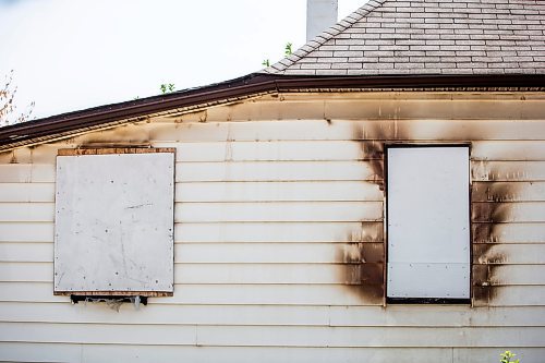 MIKAELA MACKENZIE / FREE PRESS

	
The scene of a recent fire at a vacant, boarded-up bungalow on Burrows Avenue on Tuesday, July 30, 2024. 

For Nicole story.