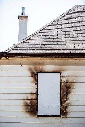 MIKAELA MACKENZIE / FREE PRESS

	
The scene of a recent fire at a vacant, boarded-up bungalow on Burrows Avenue on Tuesday, July 30, 2024. 

For Nicole story.