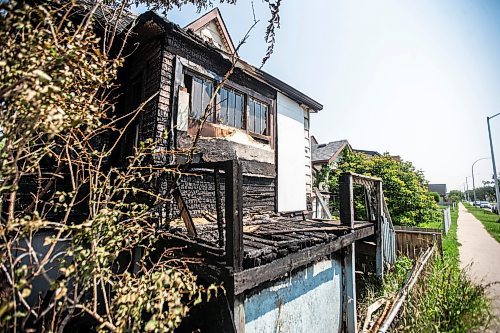 MIKAELA MACKENZIE / FREE PRESS

	
The scene of a recent fire at a vacant, boarded-up bungalow on Burrows Avenue on Tuesday, July 30, 2024. 

For Nicole story.