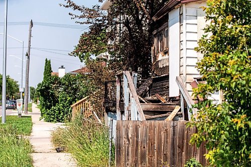 MIKAELA MACKENZIE / FREE PRESS

	
The scene of a recent fire at a vacant, boarded-up bungalow on Burrows Avenue on Tuesday, July 30, 2024. 

For Nicole story.