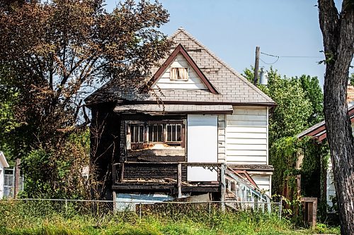 MIKAELA MACKENZIE / FREE PRESS

	
The scene of a recent fire at a vacant, boarded-up bungalow on Burrows Avenue on Tuesday, July 30, 2024. 

For Nicole story.