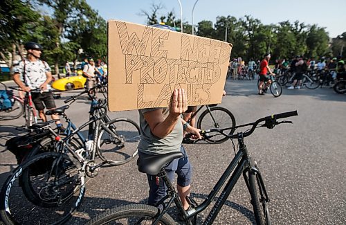 JOHN WOODS / FREE PRESS
About 180 cyclists blocked cars at the intersection of Academy and Wellington Tuesday, July 30, 2024. Cyclists want safe infrastructure after a child was hit by a driver at the intersection yesterday.

Reporter: ?