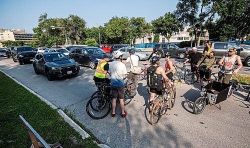 JOHN WOODS / FREE PRESS
About 180 cyclists blocked cars at the intersection of Academy and Wellington Tuesday, July 30, 2024. Cyclists want safe infrastructure after a child was hit by a driver at the intersection yesterday.

Reporter: ?