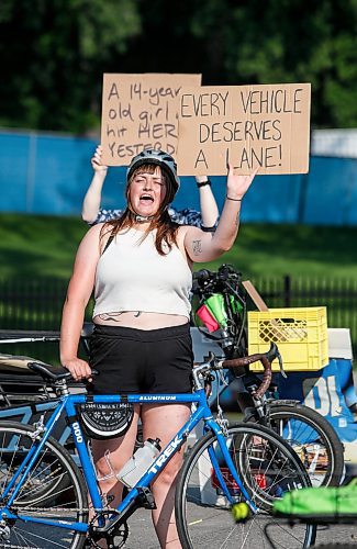 JOHN WOODS / FREE PRESS
About 180 cyclists blocked cars at the intersection of Academy and Wellington Tuesday, July 30, 2024. Cyclists want safe infrastructure after a child was hit by a driver at the intersection yesterday.

Reporter: ?