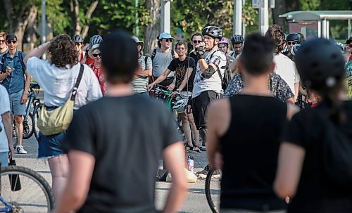 JOHN WOODS / FREE PRESS
About 180 cyclists blocked cars at the intersection of Academy and Wellington Tuesday, July 30, 2024. Cyclists want safe infrastructure after a child was hit by a driver at the intersection yesterday.

Reporter: ?