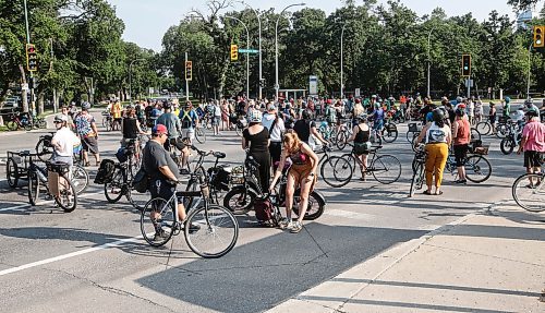 JOHN WOODS / FREE PRESS
About 180 cyclists blocked cars at the intersection of Academy and Wellington Tuesday, July 30, 2024. Cyclists want safe infrastructure after a child was hit by a driver at the intersection yesterday.

Reporter: ?