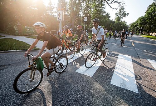 JOHN WOODS / FREE PRESS
About 180 cyclists blocked cars at the intersection of Academy and Wellington Tuesday, July 30, 2024. Cyclists want safe infrastructure after a child was hit by a driver at the intersection yesterday.

Reporter: ?