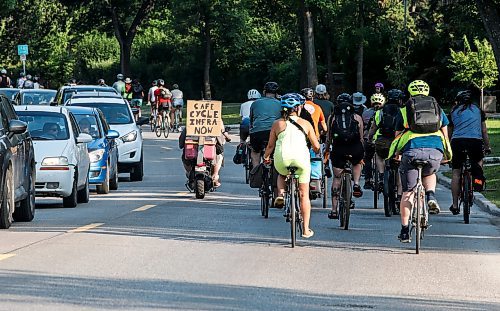 JOHN WOODS / FREE PRESS
About 180 cyclists blocked cars at the intersection of Academy and Wellington Tuesday, July 30, 2024. Cyclists want safe infrastructure after a child was hit by a driver at the intersection yesterday.

Reporter: ?