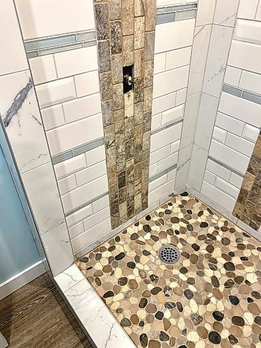 Photos by Marc LaBossiere / Free Press
This shower was tiled with leftover tile from various jobs over the years.