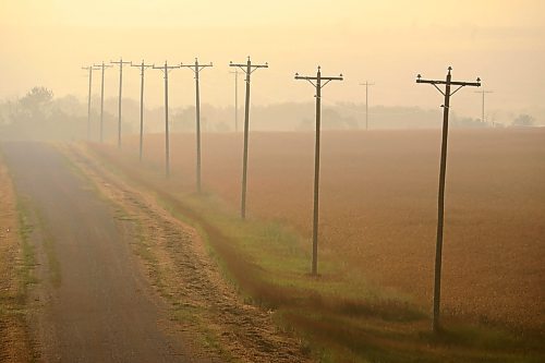 Fog hangs over land southwest of Rivers on a hazy morning.
(Tim Smith/The Brandon Sun)