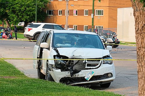 MIKE DEAL / WINNIPEG FREE PRESS
Winnipeg Police investigate a MVC between a white van and a motorcycle at Talbot Avenue and Levis Street. Talbot is closed between Brazier and Stadacona streets while they investigate. 
230614 - Wednesday, June 14, 2023