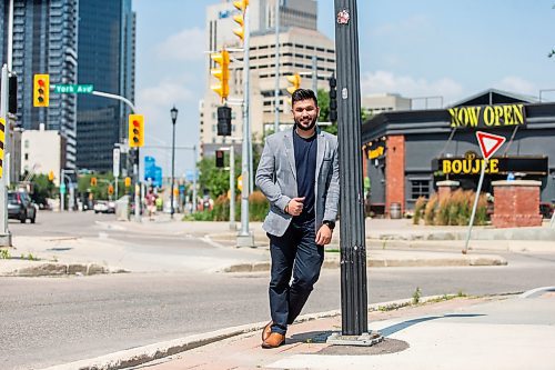 MIKAELA MACKENZIE / FREE PRESS

	
Amit Saini, co-owner of Boujee Restaurant and Bar, in front of the new downtown restaurant on Wednesday, July 31, 2024. 

For Gabby story.