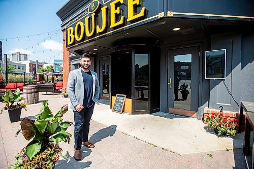 MIKAELA MACKENZIE / FREE PRESS

	
Amit Saini, co-owner of Boujee Restaurant and Bar, in front of the new downtown restaurant on Wednesday, July 31, 2024. 

For Gabby story.