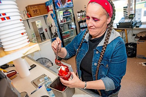 NIC ADAM / FREE PRESS
Tessa Galbichka, manager at Brian&#x2019;s, pictured making a strawberry Sunday in the kitchen of Brian&#x2019;s Drive-Inn Wednesday.
240731 - Wednesday, July 31, 2024.

Reporter: Dave
