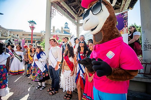 MIKAELA MACKENZIE / FREE PRESS

	
Ambassadors gather for the Folklorama kickoff at the Winnipeg Chinese Cultural and Community Centre on Thursday, Aug. 1, 2024. 

