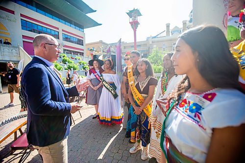 MIKAELA MACKENZIE / FREE PRESS

	
Mayor Scott Gillingham greets ambassadors at the Folklorama kickoff at the Winnipeg Chinese Cultural and Community Centre on Thursday, Aug. 1, 2024. 

