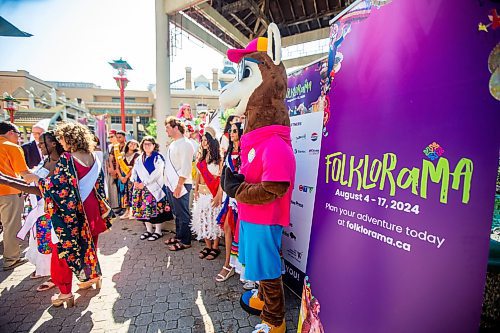 MIKAELA MACKENZIE / FREE PRESS

	
Ambassadors gather for the Folklorama kickoff at the Winnipeg Chinese Cultural and Community Centre on Thursday, Aug. 1, 2024. 

