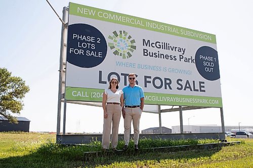 BROOK JONES / FREE PRESS
Stephen Kleysen (right), 27, who is the vice-president of T2K Enterprises Ltd., and Shannon Kleysen, 27, who is the director of administration of T2K Enterprises are pictured in front of their McGillivrary Business Park lots for sale sign in Oak Bluff, Man., Thursday, Aug. 1, 2024. The brother-sister duo, who are twins, are the children of T2K President Tom Kleysen. The McGillivray Business Park is continuing to expand as at least 20 businesses have been built or agreed to build on the 160 acres during the past two and a half years.