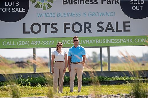 BROOK JONES / FREE PRESS
Stephen Kleysen (right), 27, who is the vice-president of T2K Enterprises Ltd., and Shannon Kleysen, 27, who is the director of administration of T2K Enterprises are pictured in front of their McGillivrary Business Park lots for sale sign in Oak Bluff, Man., Thursday, Aug. 1, 2024. The brother-sister duo, who are twins, are the children of T2K President Tom Kleysen. The McGillivray Business Park is continuing to expand as at least 20 businesses have been built or agreed to build on the 160 acres during the past two and a half years.