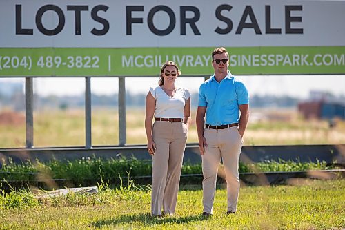 BROOK JONES / FREE PRESS
Stephen Kleysen (right), 27, who is the vice-president of T2K Enterprises Ltd., and Shannon Kleysen, 27, who is the director of administration of T2K Enterprises are pictured in front of their McGillivrary Business Park lots for sale sign in Oak Bluff, Man., Thursday, Aug. 1, 2024. The brother-sister duo, who are twins, are the children of T2K President Tom Kleysen. The McGillivray Business Park is continuing to expand as at least 20 businesses have been built or agreed to build on the 160 acres during the past two and a half years.