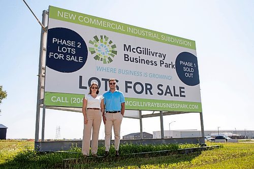 BROOK JONES / FREE PRESS
Stephen Kleysen (right), 27, who is the vice-president of T2K Enterprises Ltd., and Shannon Kleysen, 27, who is the director of administration of T2K Enterprises are pictured in front of their McGillivrary Business Park lots for sale sign in Oak Bluff, Man., Thursday, Aug. 1, 2024. The brother-sister duo, who are twins, are the children of T2K President Tom Kleysen. The McGillivray Business Park is continuing to expand as at least 20 businesses have been built or agreed to build on the 160 acres during the past two and a half years.