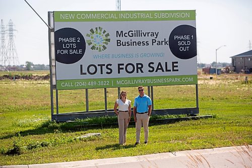 BROOK JONES / FREE PRESS
Stephen Kleysen (right), 27, who is the vice-president of T2K Enterprises Ltd., and Shannon Kleysen, 27, who is the director of administration of T2K Enterprises are pictured looking at their McGillivrary Business Park lots for sale sign in Oak Bluff, Man., Thursday, Aug. 1, 2024. The brother-sister duo, who are twins, are the children of T2K President Tom Kleysen. The McGillivray Business Park is continuing to expand as at least 20 businesses have been built or agreed to build on the 160 acres during the past two and a half years.